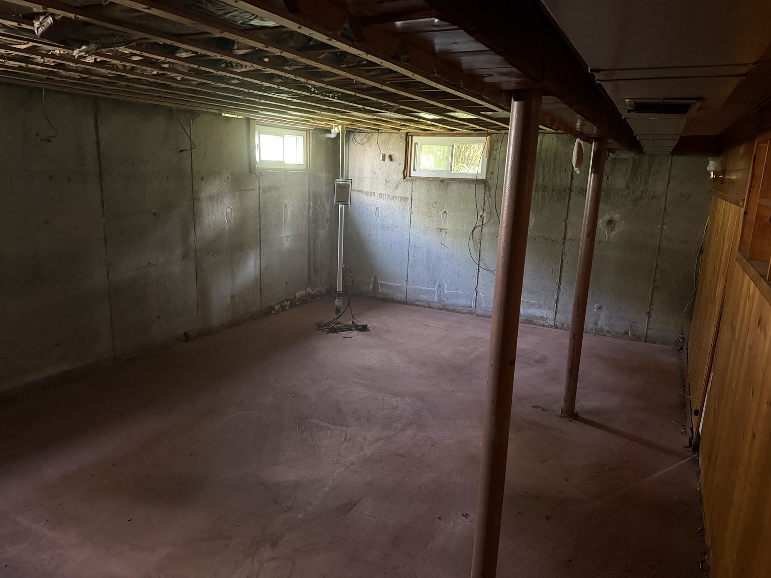 Ashland MA basement after EcoHaul removed paneling, ceiling tiles, flooring, and hauled away debris