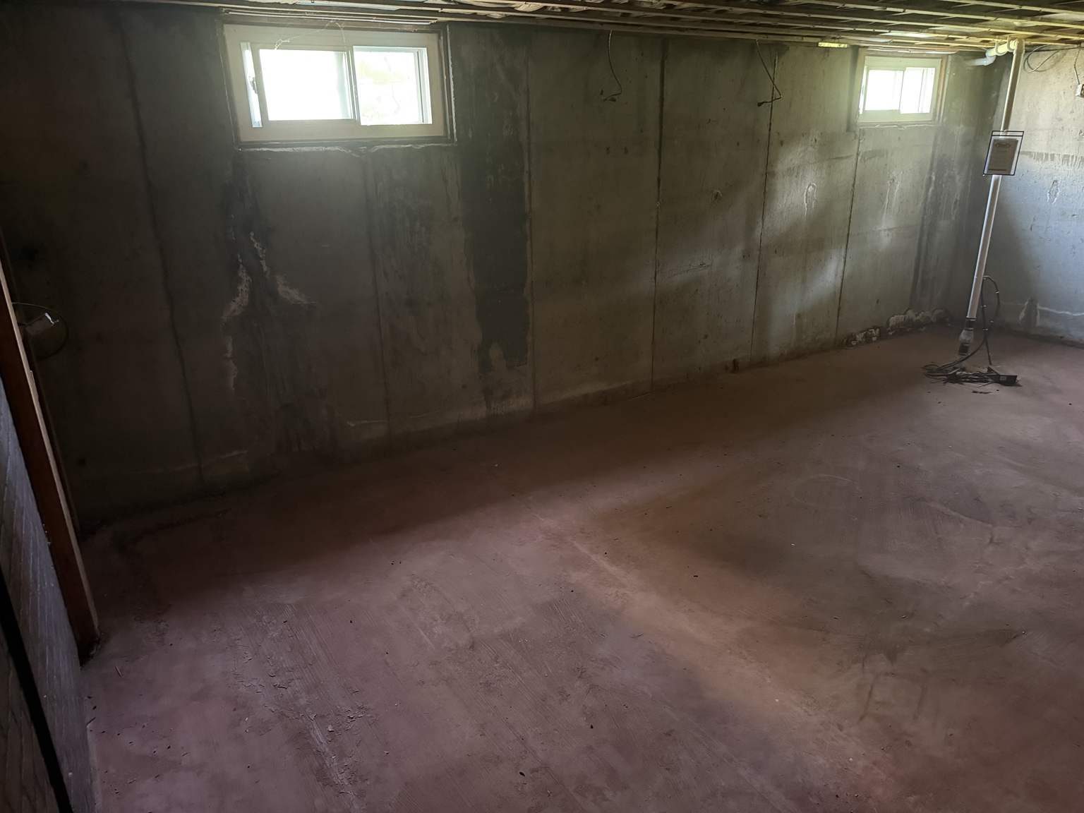 Ashland MA basement after selective interior demolition by EcoHaul