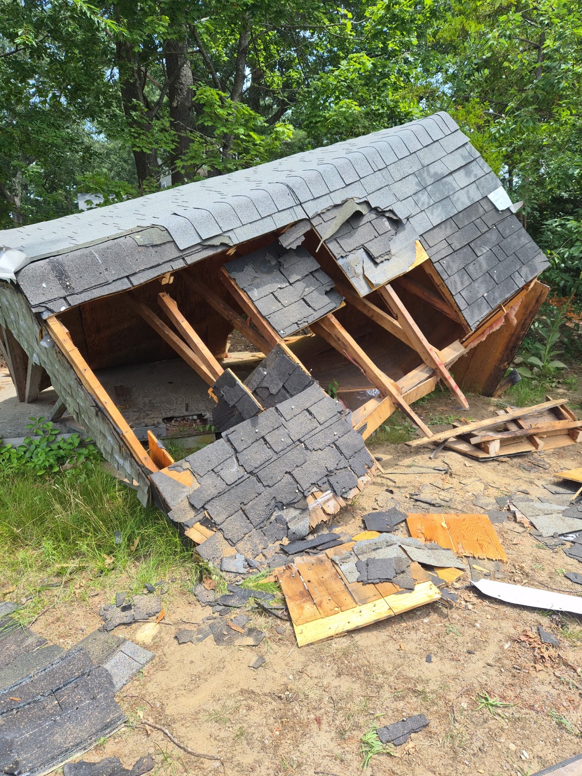 Shed demolition in progress in Marshfield MA